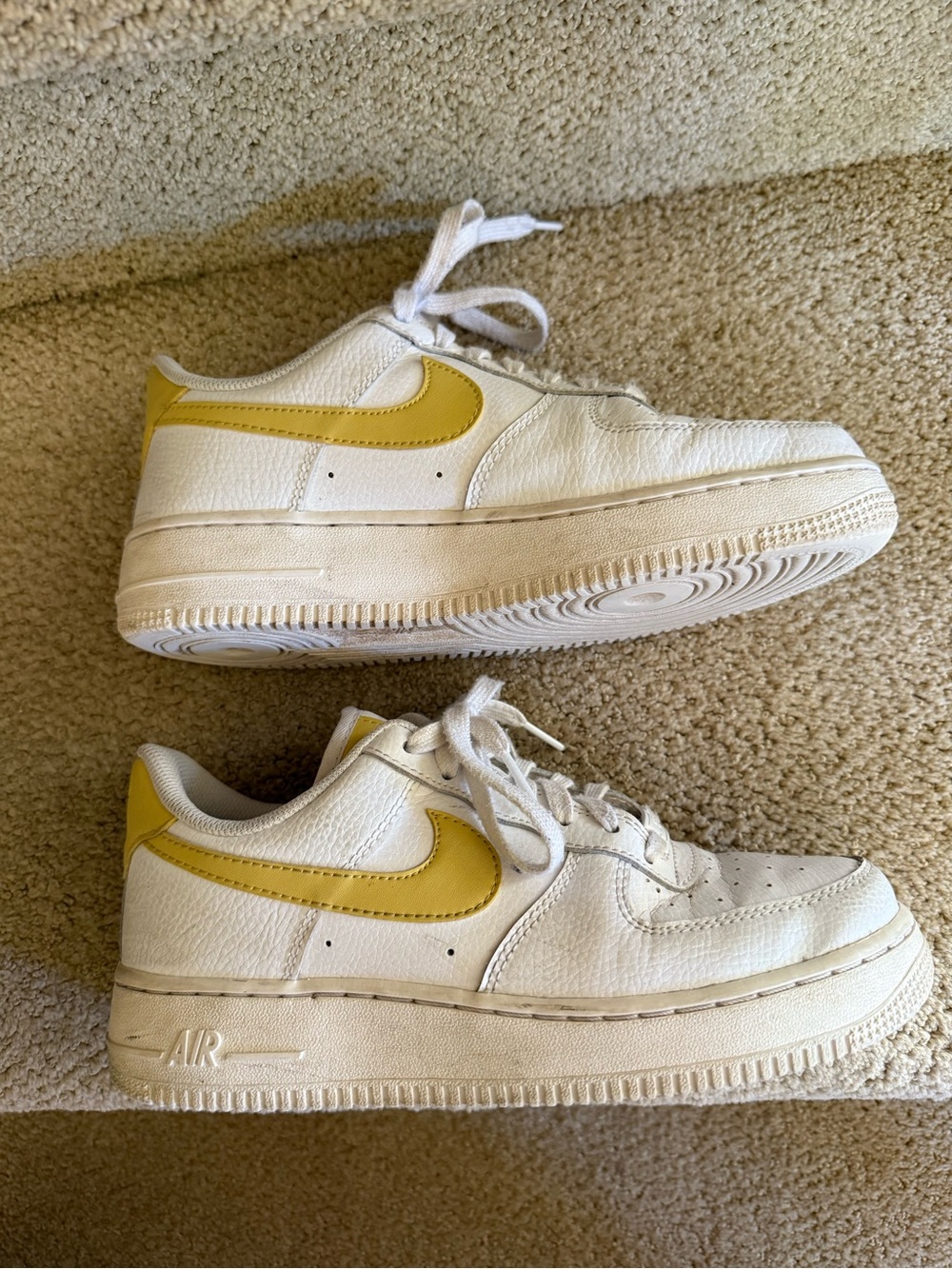 Nike White Low-Top Sneakers with Yellow Swoosh